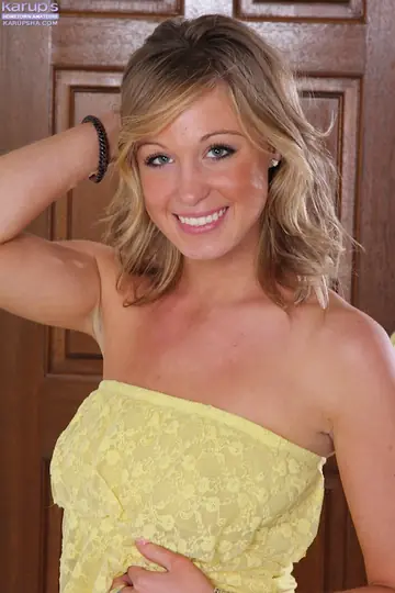 Blonde Amateur Undresses and Spreads Her Legs Wide
