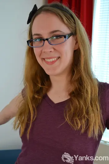 Brunette in Glasses Toys Her Shaved Pussy with a Dildo
