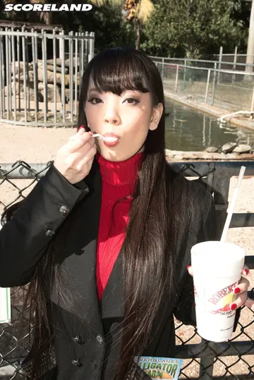 Hitomi Tanaka – Asian Woman Fills Out Her Sweater and Jeans Outdoors