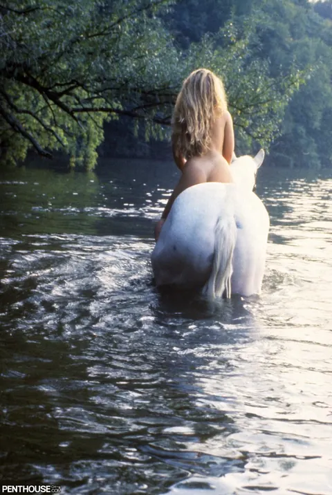 Natalie Smith: British Blonde with Big Tits Poses Nude Outdoors Near Horse – photo 12 of 12