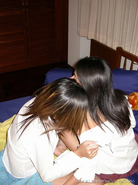 Asian Brunettes Kiss and Finger in Skirts on the Bed – photo 13 of 16