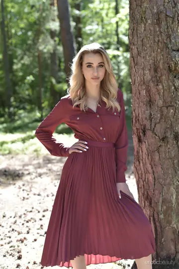 Blonde Drops Her Skirt and Poses Nude in the Forest