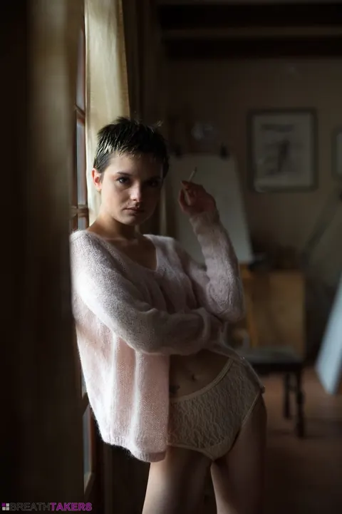 Caterina Foxy: Skinny Short-Haired Brunette Smokes Topless in Panties – photo 2 of 12
