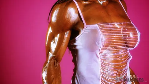 Marina Lopez: Petite Latina Bodybuilder Oils Her Big Tits While Lifting – photo 10 of 21