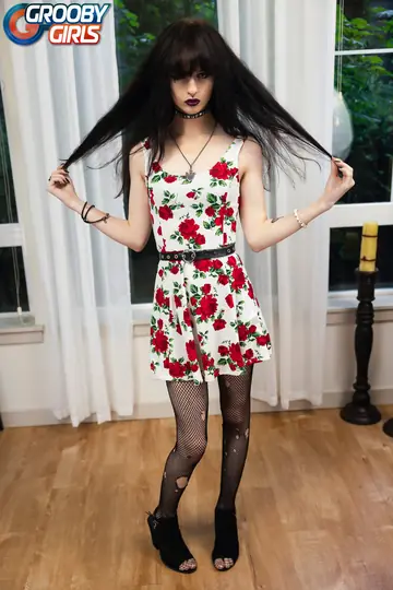 Thick Black-Haired Trans Woman in Stockings Toys Her Ass