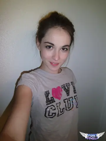 Brunette Peels Off Her Shorts for a Selfie