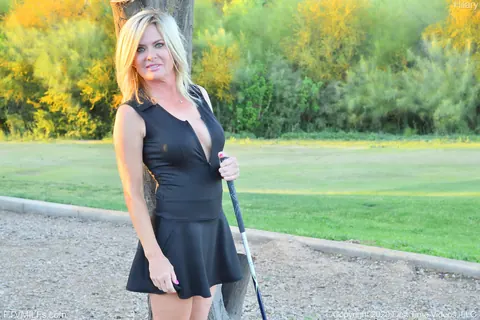 Busty Blonde MILF Flashes Panties and Cleavage Outdoors – photo 16 of 20