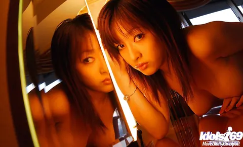 Sakura Shiratori: Busty Japanese Babe with a Thick Figure and Big Ass Undresses Nude – photo 10 of 13