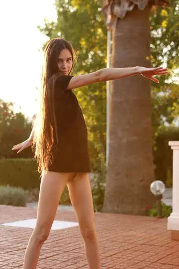 Russian Brunette Undresses by the Pool and Spreads Her Legs