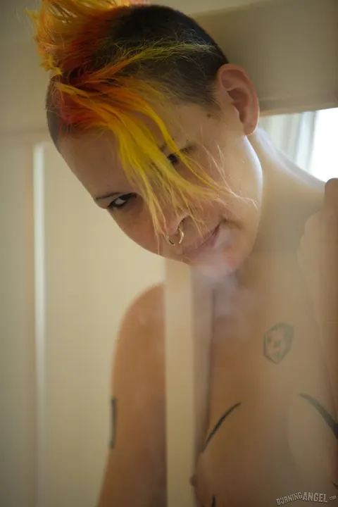 Chapel Waste: Tattooed MILF with Short Hair Poses Nude and Smokes a Cigarette – photo 6 of 16