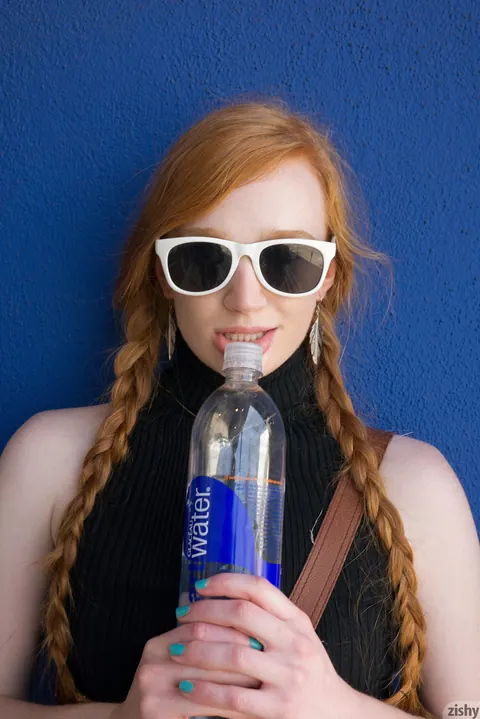 Bree Abernathy: Slim Redhead in Pigtails Lifts Her Skirt Outdoors – photo 11 of 11