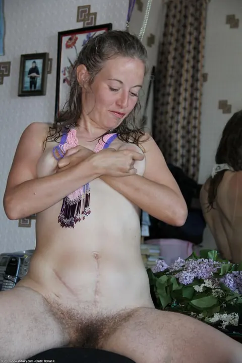 Tall Pale MILF Strips Nude to Show Her Hairy Bush – photo 7 of 21