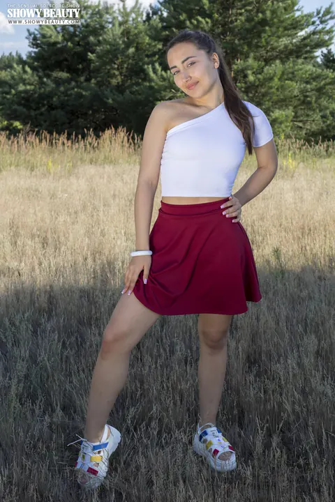 Woman Lifts Her Skirt and Spreads on a Forest Blanket – photo 2 of 20