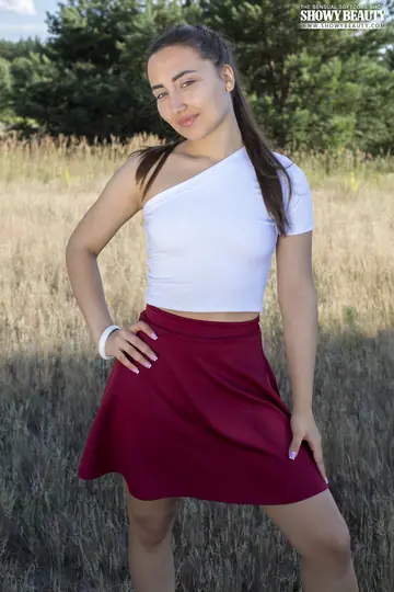 Woman Lifts Her Skirt and Spreads on a Forest Blanket