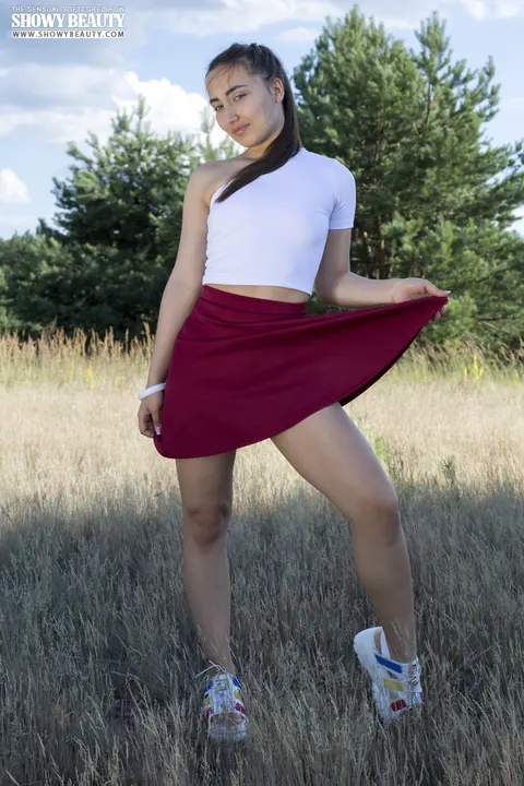 Woman Lifts Her Skirt and Spreads on a Forest Blanket – photo 3 of 20