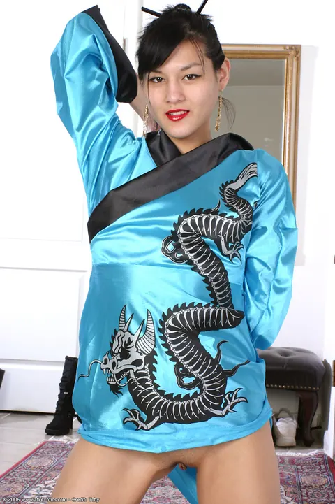 Asian Brunette Spreads Her Shaved Pussy in a Kimono – photo 15 of 16
