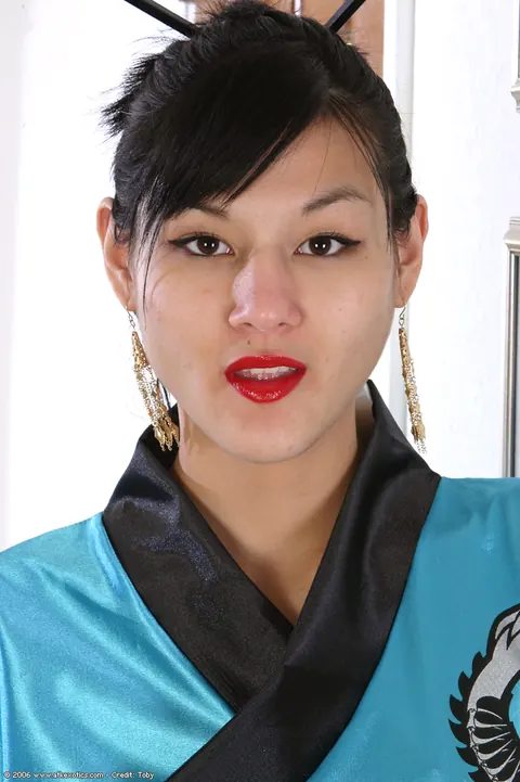 Asian Brunette Spreads Her Shaved Pussy in a Kimono – photo 1 of 16