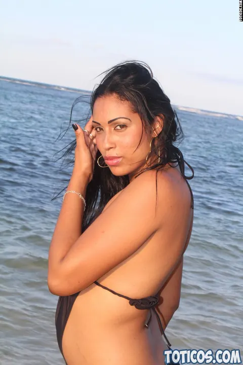 Thick Brunette Latina in a Bikini and Glasses Poses on the Beach – photo 6 of 15