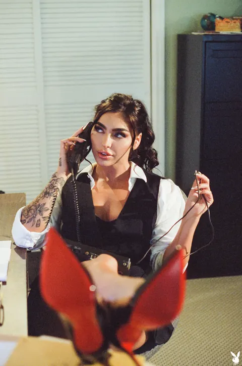 Emjay Rinaudo: Brunette in a Skirt and High Heels Flaunts Her Enhanced Tits and Tattoos – photo 3 of 20