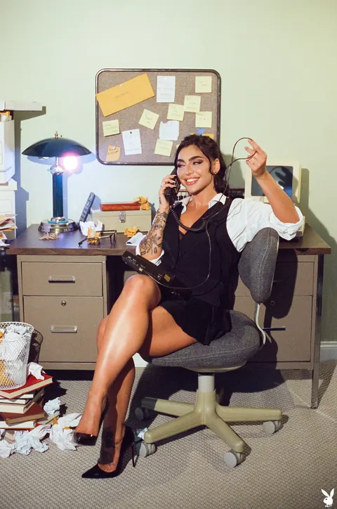 Emjay Rinaudo: Brunette in a Skirt and High Heels Flaunts Her Enhanced Tits and Tattoos – photo 2 of 20
