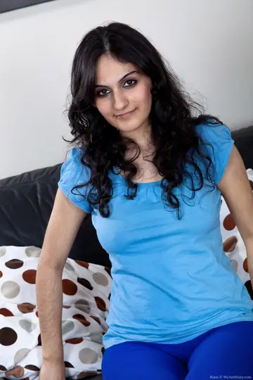 Petite Indian Babe Pulls Panties Aside and Spreads Her Hairy Bush
