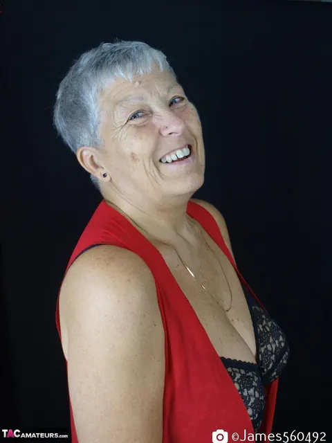 Silver-Haired Thick Woman Models Lingerie with Stockings and Heels – photo 2 of 16