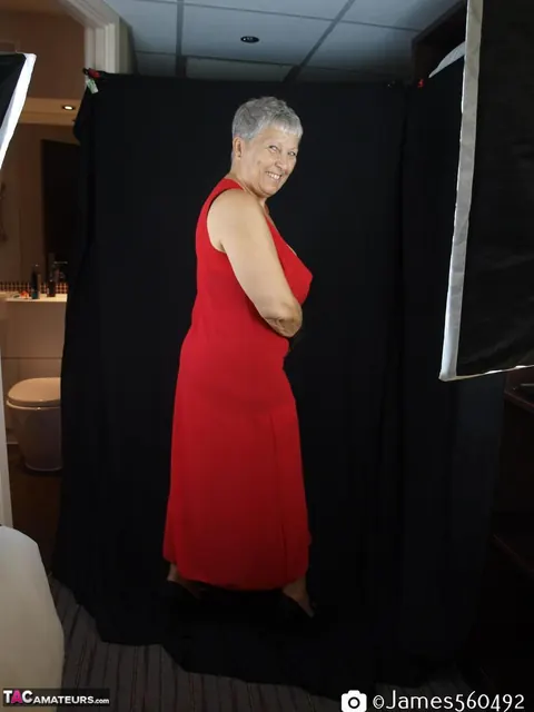 Silver-Haired Thick Woman Models Lingerie with Stockings and Heels – photo 15 of 16