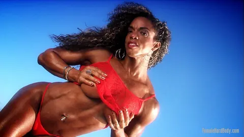 Alexis Ellis: Busty Curly Babe Shows Pierced Navel and Ass in a Bikini on the Beach – photo 6 of 21