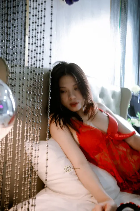 Asian Brunette Poses in Red Lingerie on the Bed – photo 6 of 21