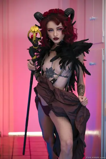 Lola Fae – Tattooed Redhead in a Costume Skirt Gives a Blowjob