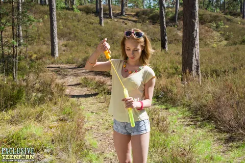 Thick Redhead Spreads Her Shaved Pussy in the Forest – photo 2 of 20