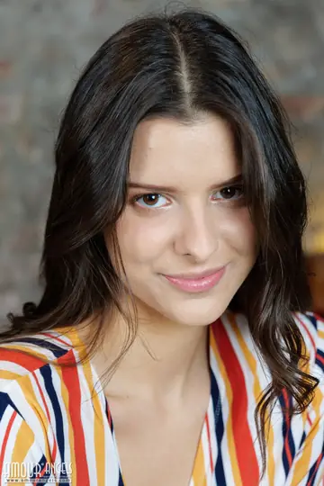 Viola Kat – Brunette Strips Out of Her Jeans on a Wooden Trunk