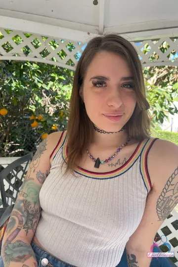 Tattooed Russian Brunette Peels Off Her Jeans to Finger Her Hairy Pussy