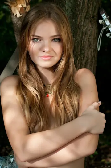 Slim Russian Redhead Spreads Her Shaved Pussy Outdoors