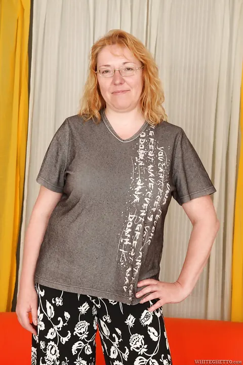 Mature Redhead Strips Out of Her Lingerie and Spreads Her Legs – photo 1 of 16