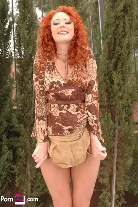 Audrey Hollander: Tall Redhead MILF Lifts Her Dress and Shows Panties Outdoors – photo 17 of 21