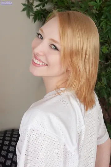 Blonde with Enhanced Tits Undresses for Anal