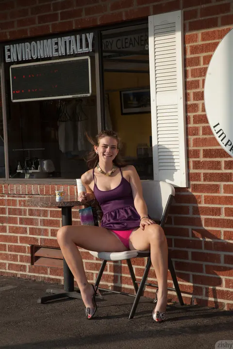 Tristyn Berrimore: Brunette Lifts Her Skirt to Flash Panties and Cleavage Outdoors – photo 8 of 11