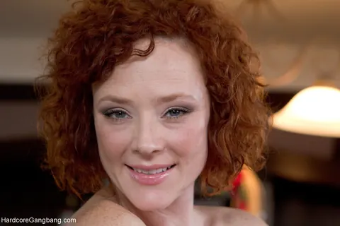 Audrey Hollander: Short Curly Redhead MILF Shows Off Her Feet in Jeans – photo 20 of 20