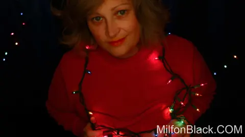 BBW MILF with Big Tits Poses Under Christmas Lights – photo 9 of 15