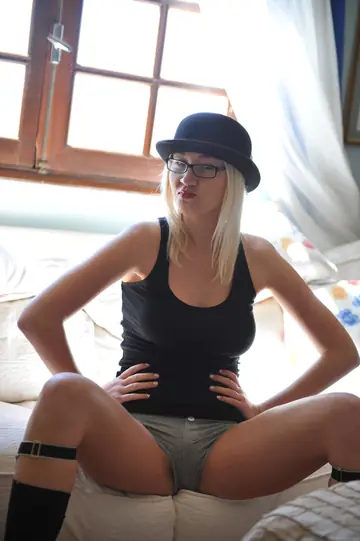 Czech MILF in Panties, Socks and Glasses Spreads Her Pussy in the Bedroom