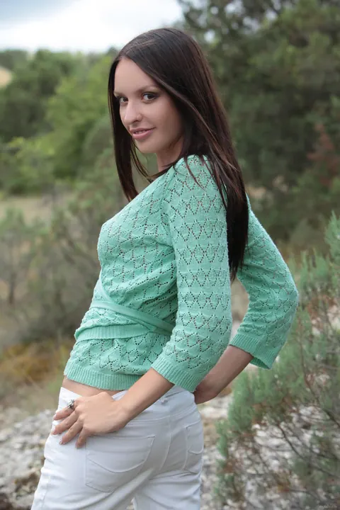 Petite Slim Woman in Jeans Spreads Her Legs Outdoors – photo 2 of 21