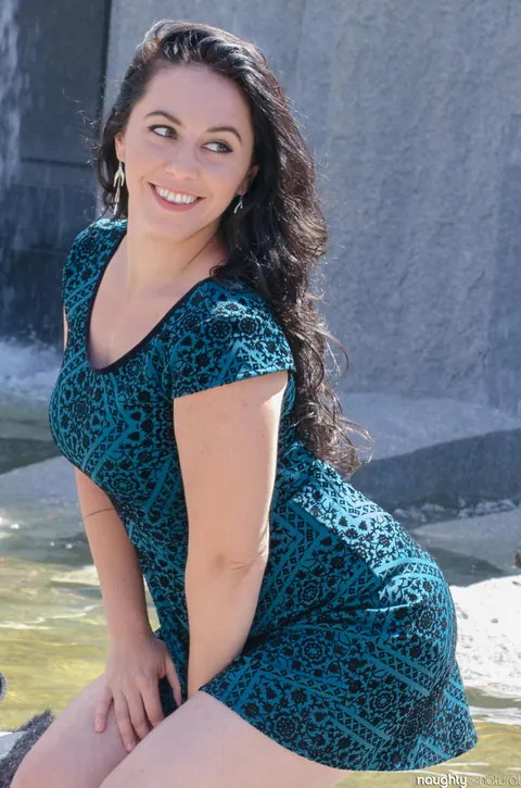 Nikki Silver: Busty Brunette in Glasses Poses in a Dress and Heels Outdoors – photo 12 of 20