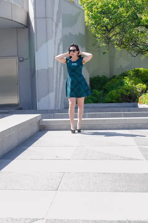 Nikki Silver: Busty Brunette in Glasses Poses in a Dress and Heels Outdoors – photo 15 of 20