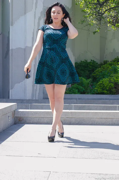 Nikki Silver: Busty Brunette in Glasses Poses in a Dress and Heels Outdoors – photo 18 of 20