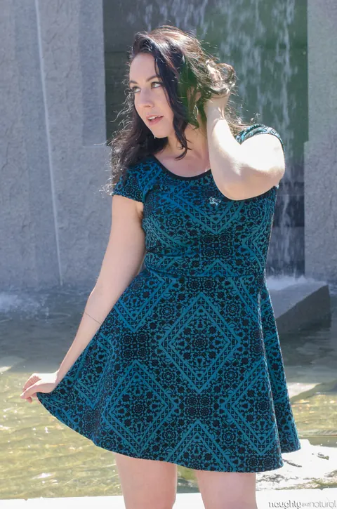 Nikki Silver: Busty Brunette in Glasses Poses in a Dress and Heels Outdoors – photo 14 of 20