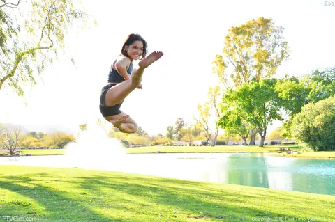 Zoe Bloom: Skinny Brunette Exercises Outdoors in Shorts by the Water – photo 10 of 20