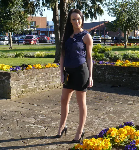 Brunette Adjusts Heels and Spreads Her Legs Outdoors – photo 14 of 16