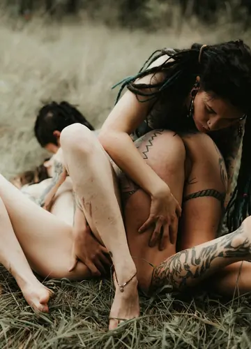 Three Tattooed Women Kiss and Lick Pussy Outdoors