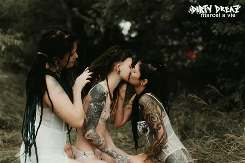 Three Tattooed Women Kiss and Lick Pussy Outdoors – photo 10 of 16